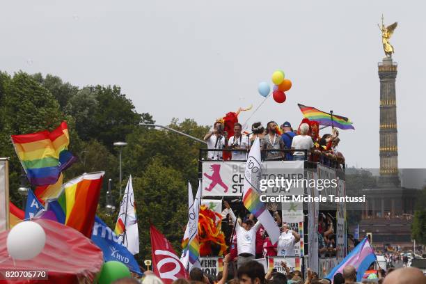 Revelers dance on decorated trucks during the 2017 Christopher Street Day gay pride celebration on July 22, 2017 in Berlin, Germany. The Bundestag,...