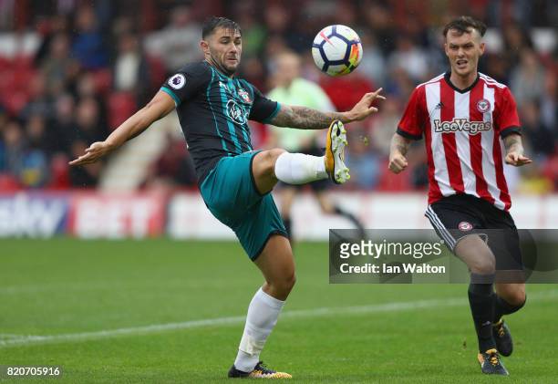 Charlie Austin of Southampton in action during the Pre Season Friendly match between Brentford and Southampton at Griffin Park on July 22, 2017 in...