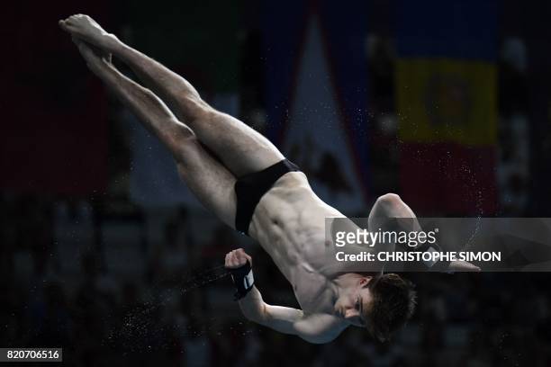 Great Britain's Matthew Lee competes in the Men's 10m plaform final during the diving competition at the 2017 FINA World Championships in Budapest,...