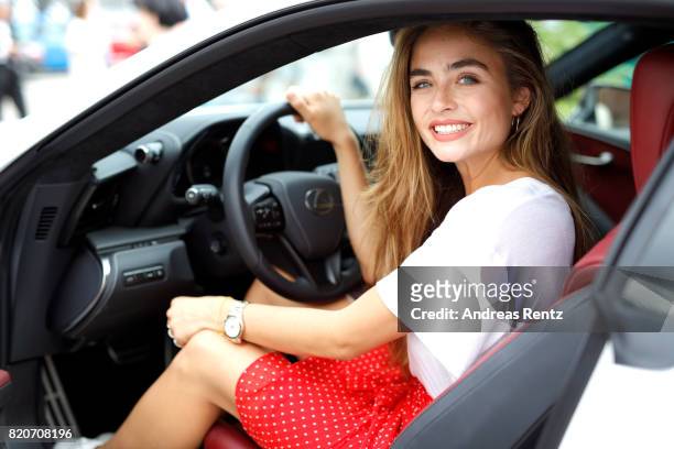 Sofia Tsakiridou poses in a Lexus at the 3D Fashion Presented By Lexus/Voxelworld show during Platform Fashion July 2017 at Areal Boehler on July 22,...