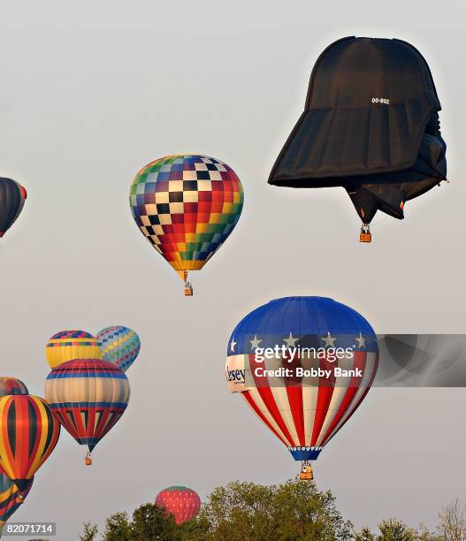 Darth Vader balloon rises during the Sunset Mass Ascension of 125 balloons at the 2008 Quick Chek New Jersey Festival of Ballooning at Solberg...