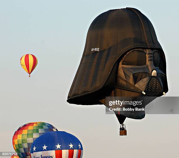 Darth Vader balloon rises during the Sunset Mass Ascension of 125 balloons at the 2008 Quick Chek New Jersey Festival of Ballooning at Solberg...