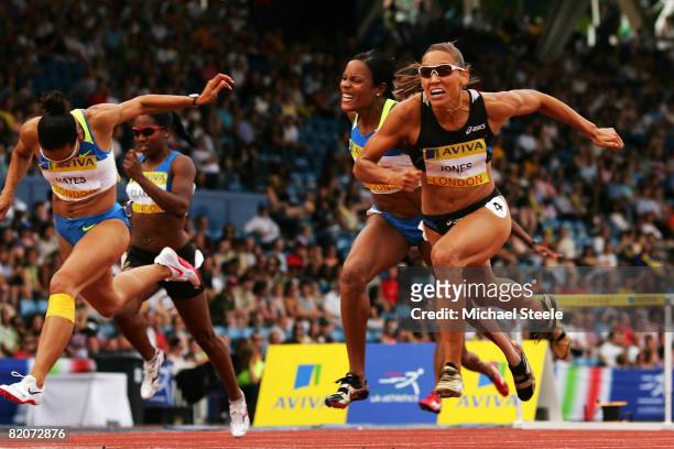 Lolo Jones of United States competes on the way to winning first place in the Women's 100 Metres Hurdles Final during day 2 of the Norwich Union...