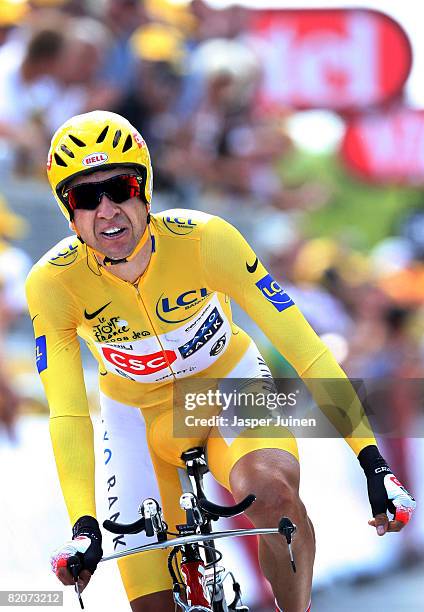 Race leader Carlos Sastre of Spain and team CSC Saxo Bank crosses the finishline at the end of the final time trail of the 2008 Tour de France from...