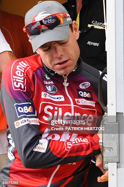 Second placed in the overall standings, Australian team leader Cadel Evans , makes a face as he leaves the anti-doping control bus after undergoing...