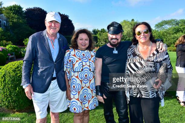 Juergen Friedrich, Angie Samii, Peter Marino and Anke Friedrich attend ARF in the Garden of Peter Marino at a Private Residence on July 15, 2017 in...