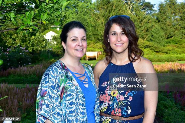 Guest and Catherine Philbin attend ARF in the Garden of Peter Marino at a Private Residence on July 15, 2017 in Southampton, NY.