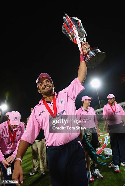 Murali Kartik of Middlesex celebrates with the trophy during the Twenty20 Cup Final match between Kent and Middlesex at the Rosebowl on July 26, 2008...