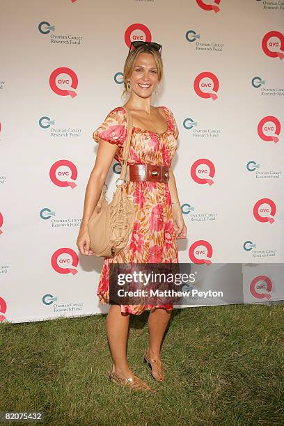 Model Molly Sims attends QVC Live from the Hamptons at Nova's Ark July 26, 2008 in Watermill, New York.