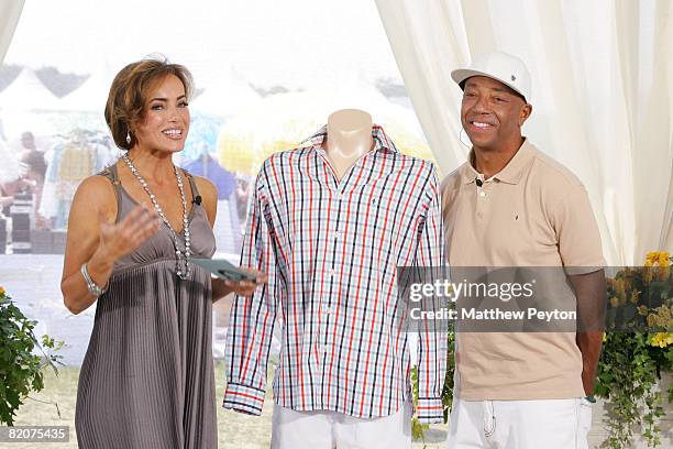 Host Lisa Robertson and Russell Simmons on the set of Live from the Hamptons at Nova's Ark July 26, 2008 in Watermill, New York.