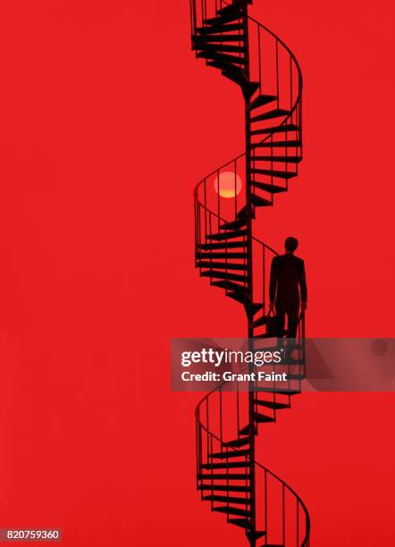 businessman climbing staircase. - salire le scale foto e immagini stock