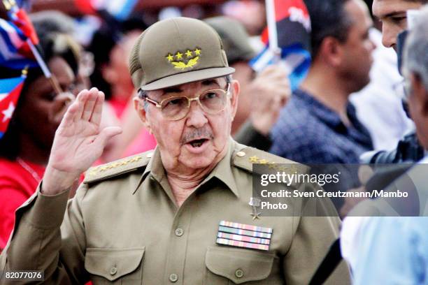 Cuba's President and brother of Revolution leader Fidel Castro, Raul Castro waves as he arrives to deliver a speech in front of the Moncada military...
