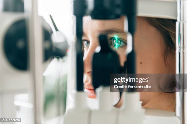 eye check up - eye scanner stock pictures, royalty-free photos & images