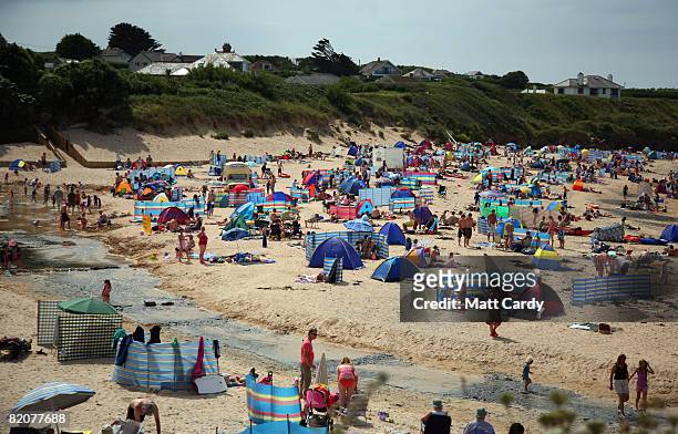 People enjoy the weather on the beach at Harlyn Bay on July 26, 2008 in Harlyn near Padstow, England. David Cameron, leader of the opposition, who's...