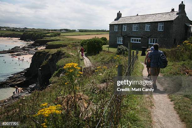 People enjoy the weather on the beach at Harlyn Bay on July 26, 2008 in Harlyn near Padstow, England. David Cameron, leader of the opposition, who's...