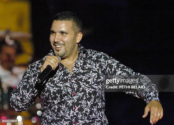 Algerian Rai singer Chab Ridha Talyani performs during the 44th International Carthage festival on 26 July 2008 at the Roman theatre in Carthage,...