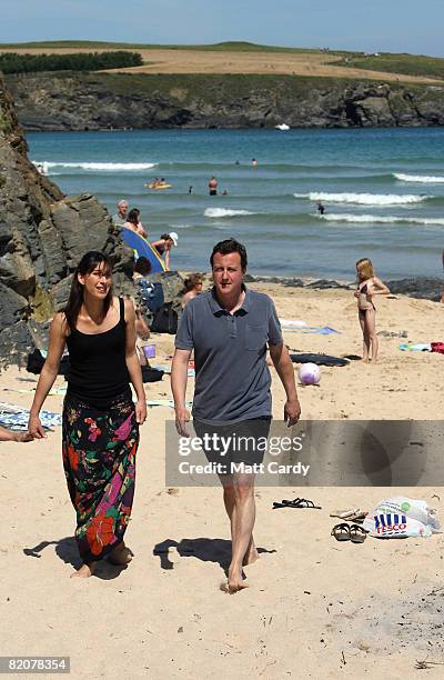 David Cameron and his wife Samantha walk on the beach at Harlyn Bay on July 27, 2008 in Harlyn, near Padstow, England. David Cameron, leader of the...