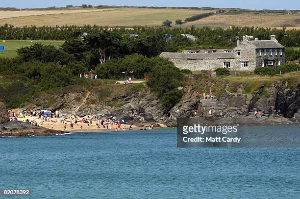 People enjoy the weather on the beach at Mother Iveys Bay next to Harlyn Bay on July 27, 2008 in Harlyn near Padstow, England. David Cameron, leader...