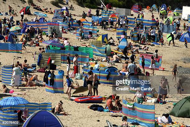 People enjoy the weather on the beach at Harlyn Bay on July 27, 2008 in Harlyn near Padstow, England. David Cameron, leader of the opposition, who's...