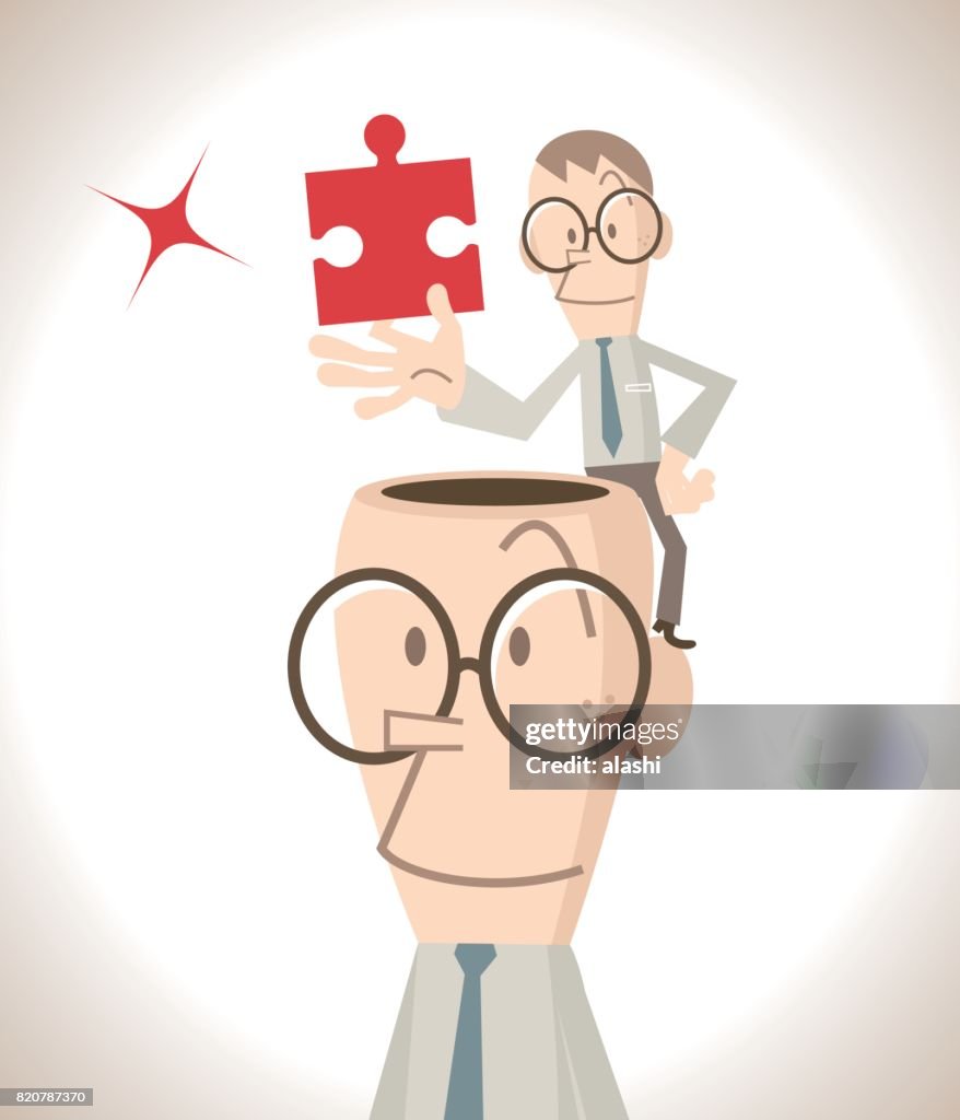 Small businessman putting an important jigsaw piece in the big man's open head (Got a solution)
