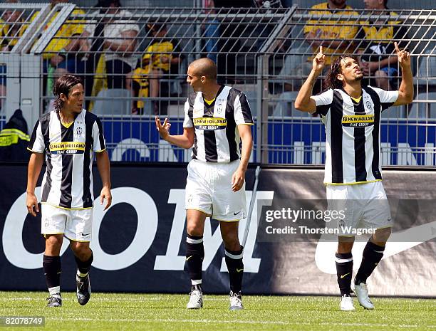 Amauri Carvalho celebrates after scoring to 1:0 with his teammate during the Pre Season international friendly match between Borussia Dortmund and...