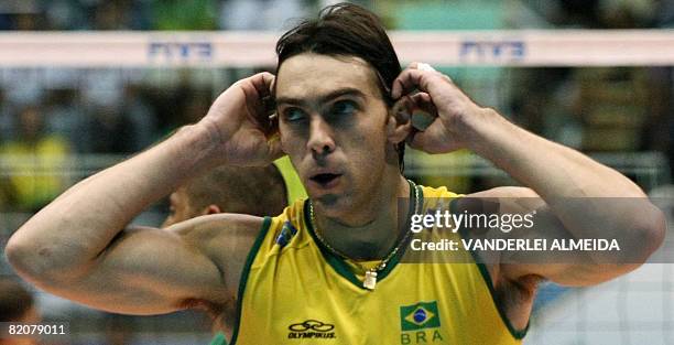 Brazil's Gilberto "Giba" Godoy gestures during their International Volleyball Federation World League match for the 3rd place against Russia at...