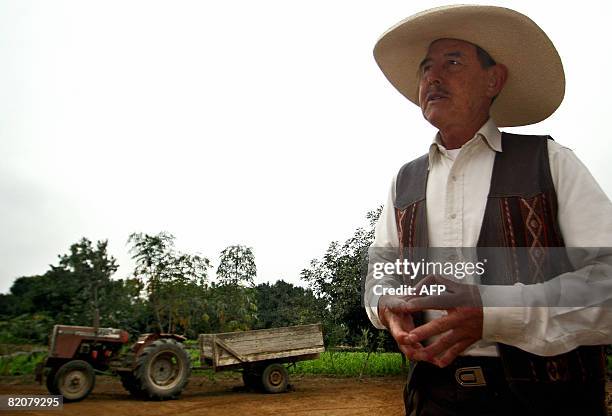 Owner Ulises Moreno talks about his guinea pig farm in Pachacamac, 40 kms south of Lima, on July 23 2008. Moreno runs Casa Blanca biofarm where...
