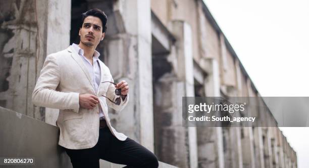 businessman outdoors - male fashion model stock pictures, royalty-free photos & images
