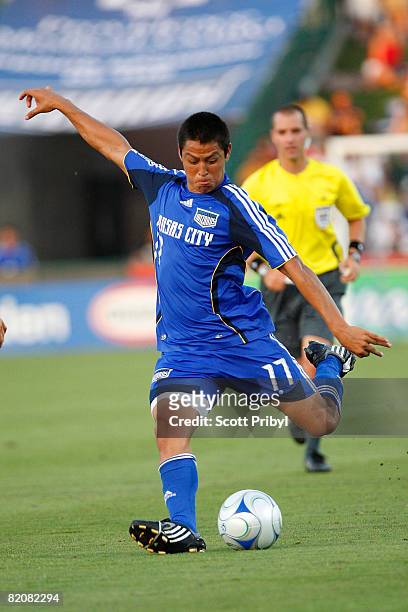 Roger Espinoza of the Kansas City Wizards shoots the ball against the Chicago Fire during the game at Community America Ballpark on July 27, 2008 in...