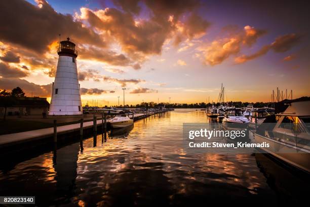 lakeview marina in windsor, ontario, canada - lighthouse sunset stock pictures, royalty-free photos & images