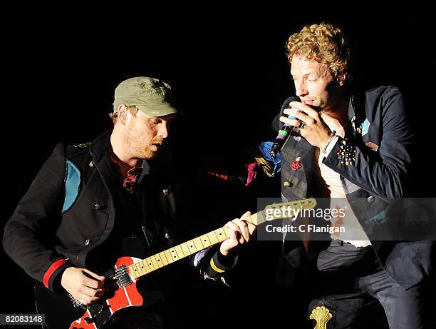 Guitarist Jonny Buckland and Vocalist Chris Martin of Coldplay perform on day three of the 2008 Pemberton Music Festival on July 27, 2008 in...