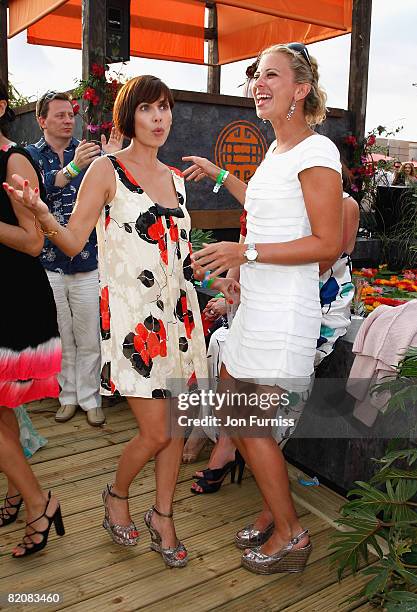 Singer Natalie Imbruglia and Holly Branson at the Chinawhite Tent during the Cartier International Polo held at Guards Polo Club on July 27, 2008 in...