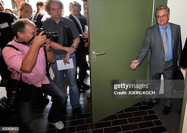 Former Siemens director Reinhard S. Leaves the courtroom after his verdict was spoken on July 28, 2008 in Munich, southern Germany. The court...