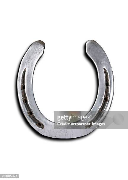 a horseshoe - horseshoes stockfoto's en -beelden