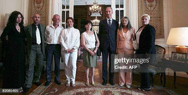 France's Ambassador to Bulgaria Etienne du Poncins poses at the French embassy in Sofia, Bulgaria, on July 28, 2008 together with Olya wife of...