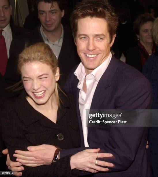 Actress Renee Zellweger hugs actor Hugh Grant at the premiere of "Bridget Jones's Diary" April 2, 2001 in New York City.