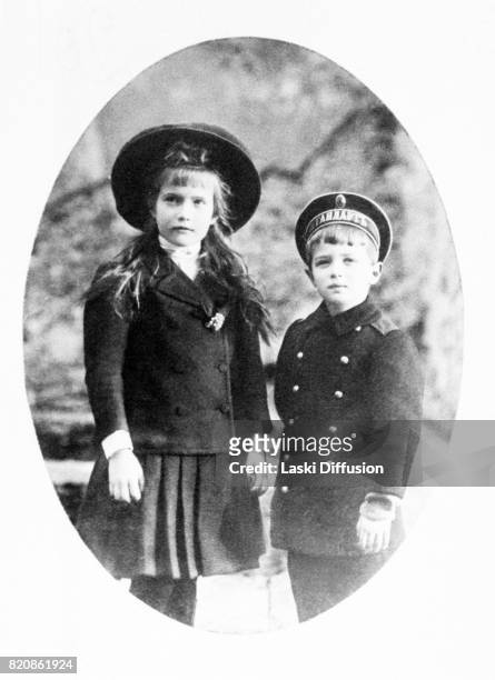 Circa 1910: Grand Duchess Anastasia and Tsarevich Alexei, children of Tsar Nicholas II Romanov and Empress Alexandra Feodorovna, circa 1910.