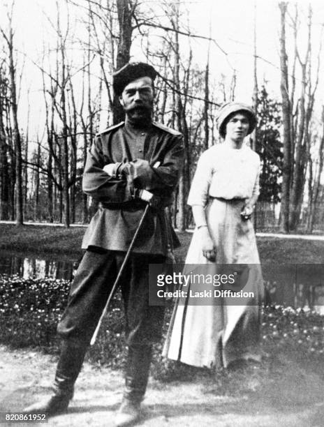 Circa 1915: Tsar Nicholas II Romanov with his daughter Grand Duchess Olga. Russia, circa 1915.