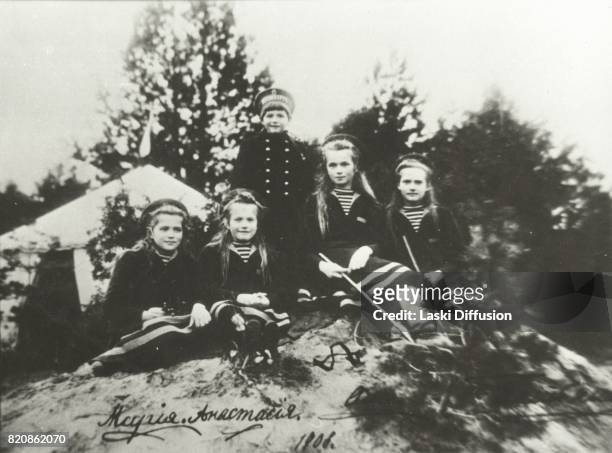 Circa 1910: Grand Duchesses Tatiana, and Maria, Tsarevich Alexei, Grand Duchesses Olga and Anastasia - children of Tsar Nicholas II Romanov of Russia...