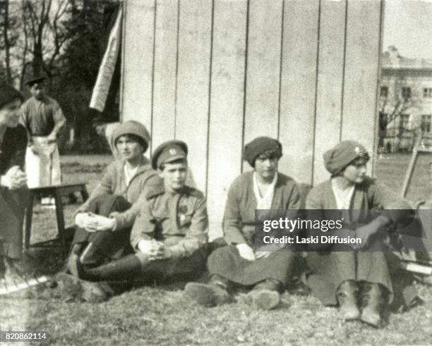 Tsarevich Alexei Romanov and three Grand Duchesses of Russia after the abdication of their father Tsar Nicholas II Romanov. Tsarskoye Selo, Russia,...