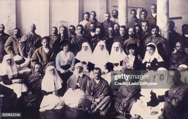 Grand Duchesses Maria and Anastasia, daughters of Tsar Nicholas II Romanov, visit a hospital during World War I. Picture coloured by one of Tsar's...