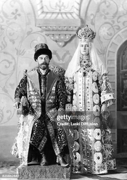 Tsar Nicholas II Romanov and Empress Alexandra Feodorovna Romanova in historical costumes. Russia, 1903.