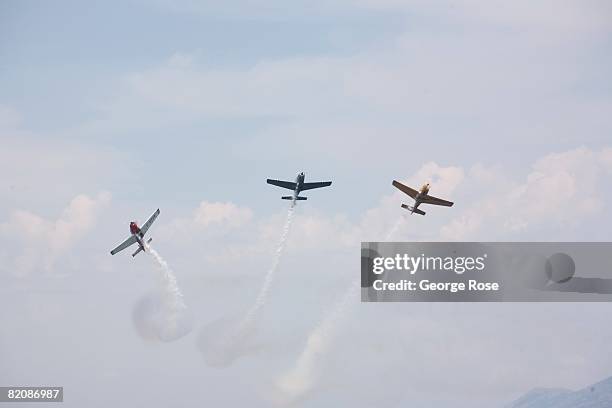 Aerial acrobatic planes fly overhead in formation during Canada Day festivities in this 2008 Penticton, British Columbia, Canada, summer photo....