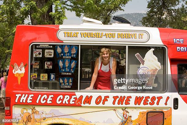 An ice cream truck vendor waits for customers during Canada Day festivities in this 2008 Penticton, British Columbia, Canada, summer photo. Canada...