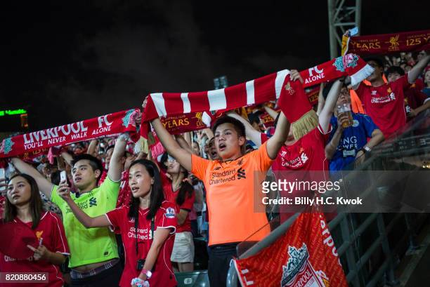 Soccer fans cheer during the Premier League Asia Trophy match between Liverpool FC and Leicester City FC at Hong Kong Stadium on July 22, 2017 in...