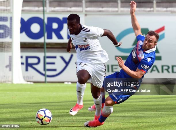 Amiens' Guinean middlefielder Aboubacar Camara vies with Stoke City's Swiss midfielder Xherdan Shaqiri during a football friendly match between...