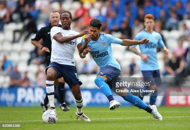 Daniel Johnson of Preston North End is challenged by Ayoze Perez of Newcastle United during a pre-season friendly match between Preston North End and...
