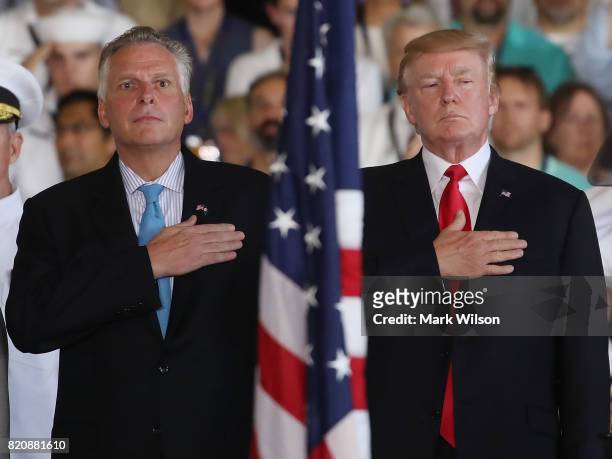 President Donald Trump stands with Virginia Governor Terry McAuliffe during a commissioning ceremony on board the USS Gerald R. Ford CVN 78, on July...