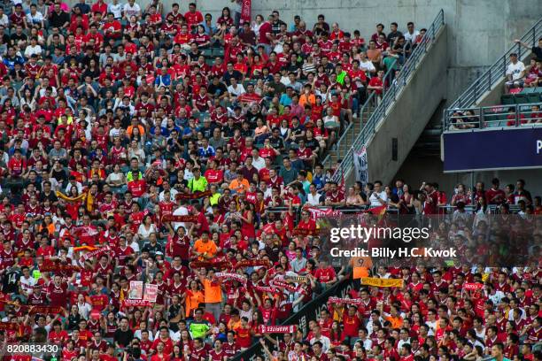 Soccer fans cheer during the Premier League Asia Trophy match between West Brom and Crystal Palace at Hong Kong Stadium on July 22, 2017 in Hong...