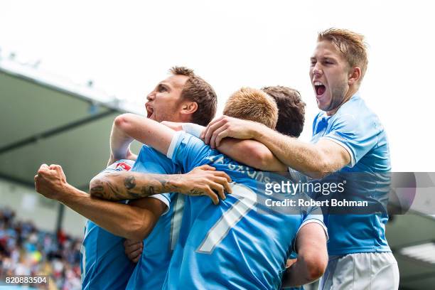 Magnus Wolf Eikrem of Malmo FF and Anton Tinnerholm of Malmo FF celebrates after scoring during the Allsvenskan match between Malmo FF and Jonkopings...